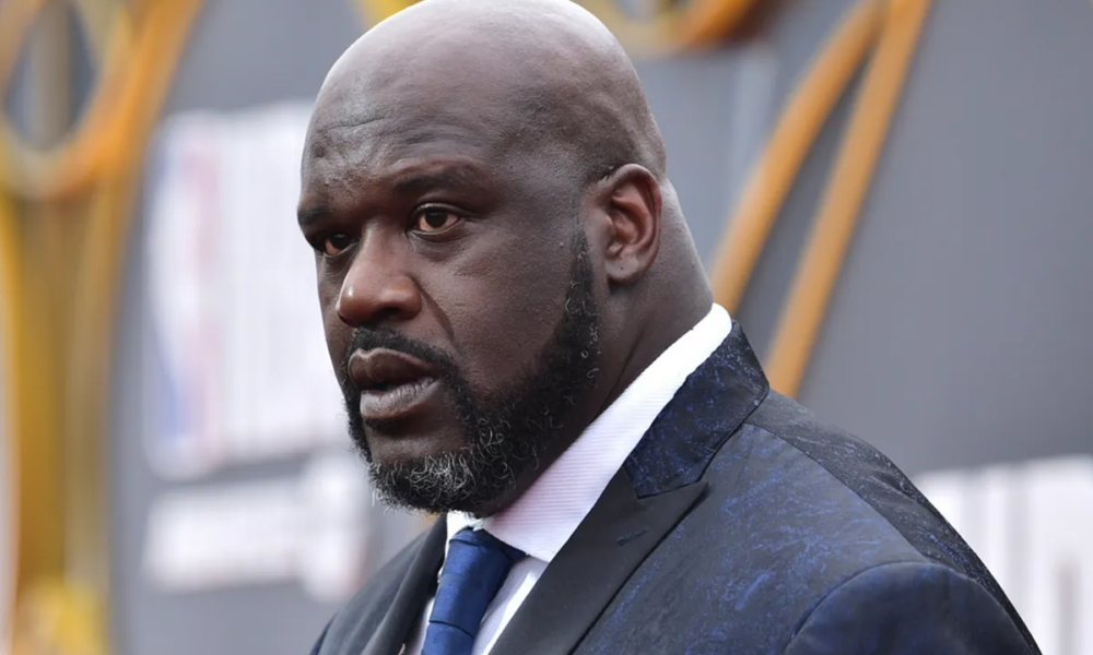 A giant helping another achieve his dream: Shaquille O'Neal helps a young man become a police officer