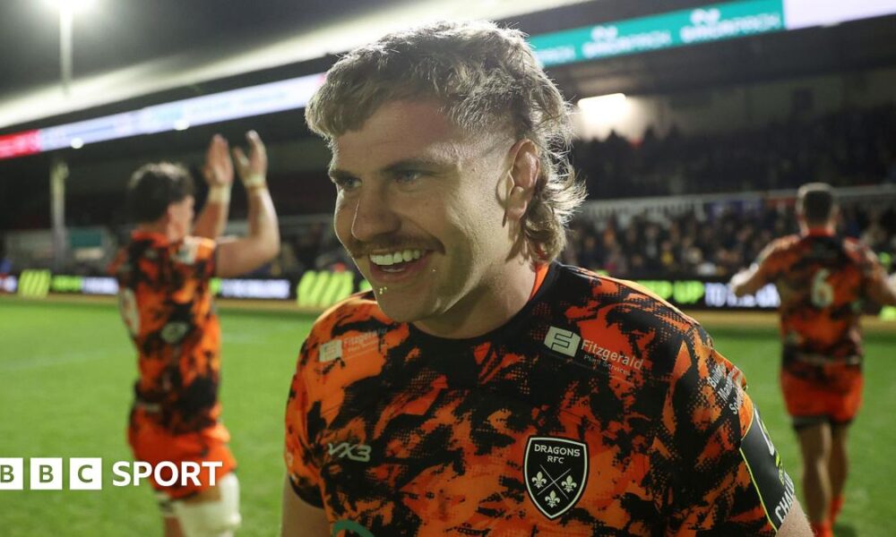 Dragons forward Aaron Wainwright smiles after the Challenge Cup win against Lyon at Rodney Parade