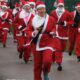 Hundreds of Santas Chase the Pud at York Racecourse