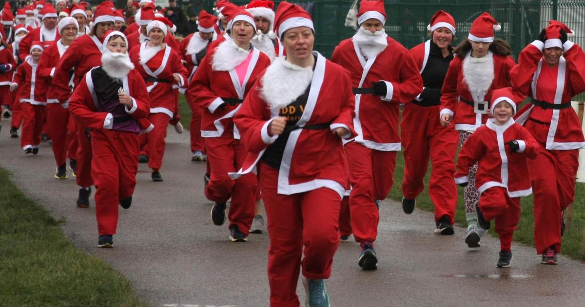 Hundreds of Santas Chase the Pud at York Racecourse
