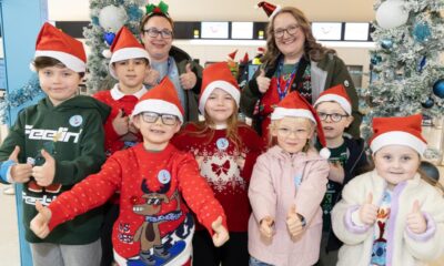 Children take festive Santa Flight from Manchester Airport
