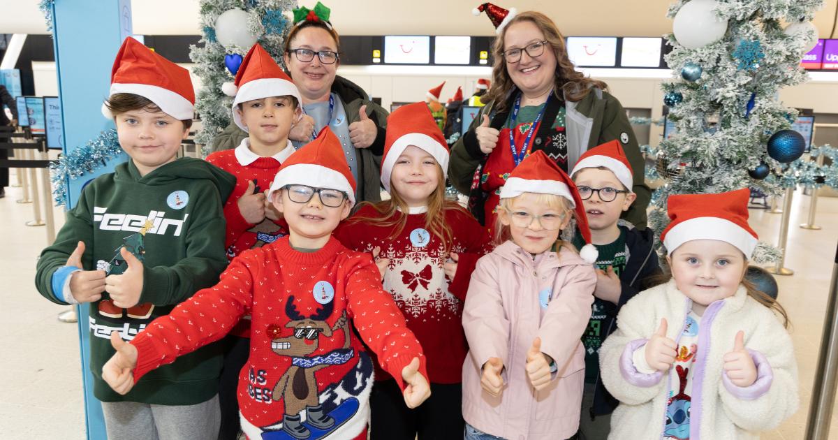 Children take festive Santa Flight from Manchester Airport