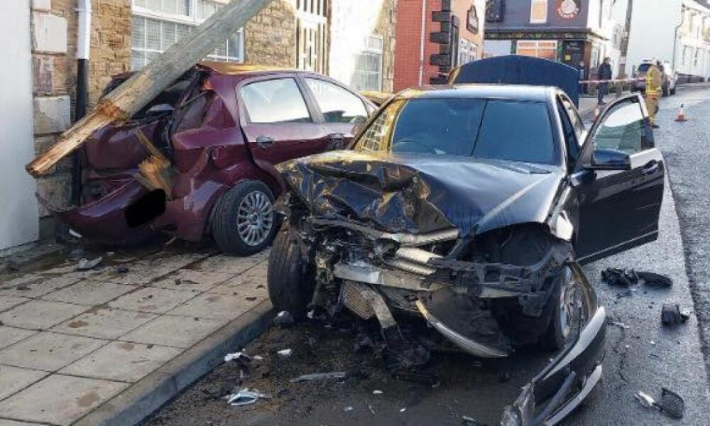 Woman charged with drink-driving as car crashes into house and snaps telegraph pole