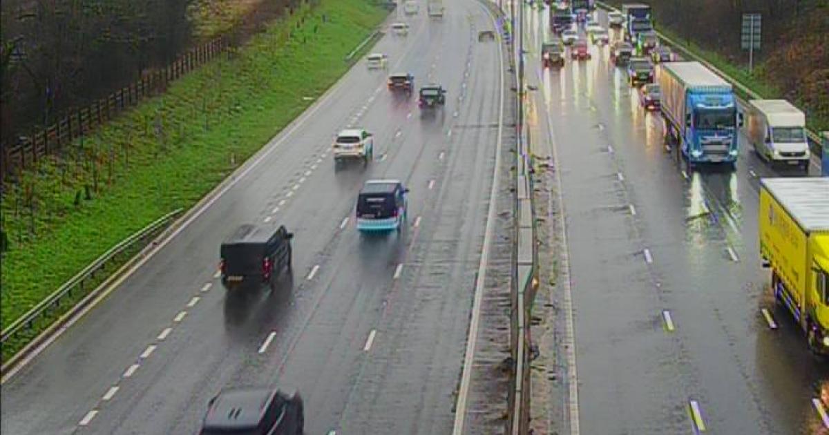 Motorway lanes shut near airport due to flooding  - live updates