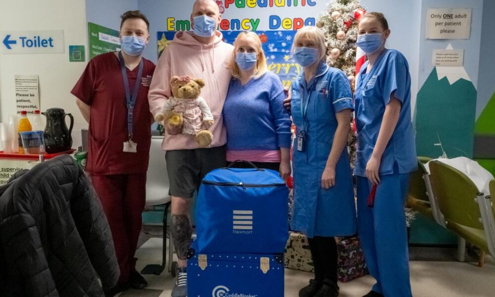 Quakers Running Club donate cuddle blanket to Darlington hospital