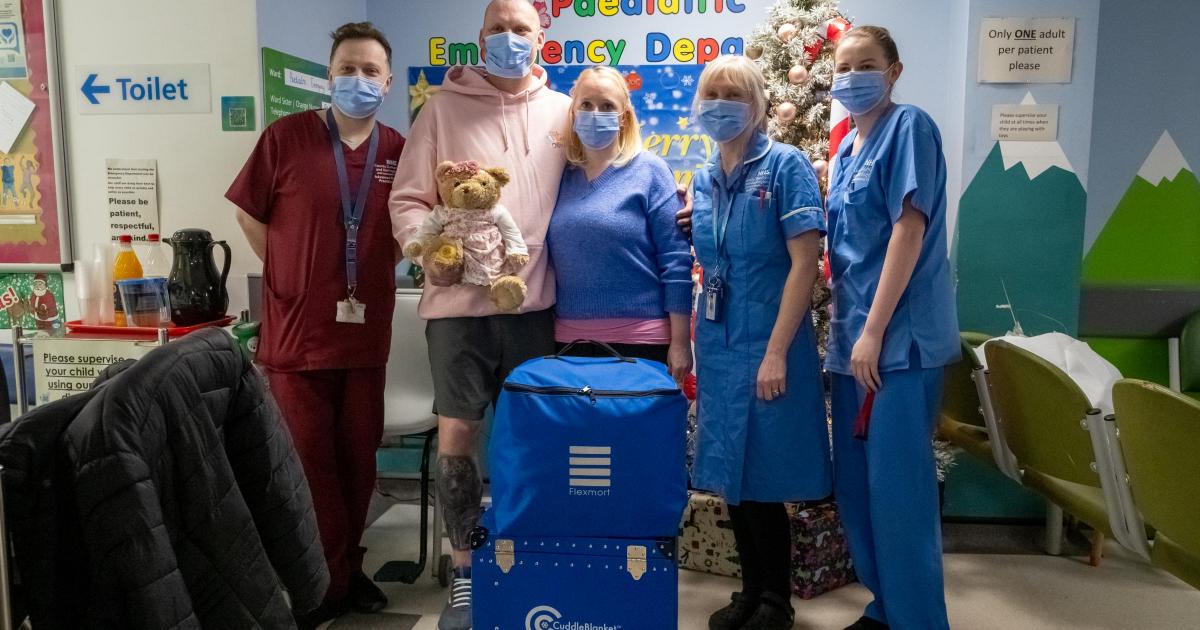 Quakers Running Club donate cuddle blanket to Darlington hospital