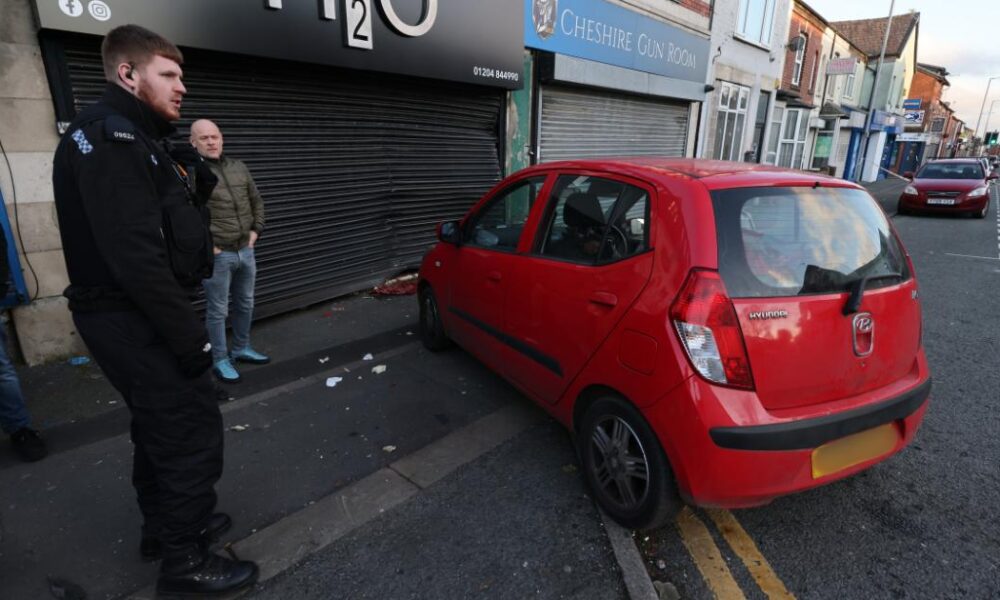 Car smashes into Bolton shopfront in Boxing Day crash