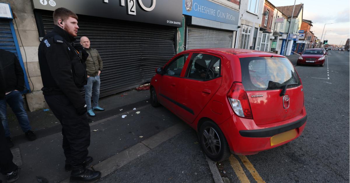 Car smashes into Bolton shopfront in Boxing Day crash