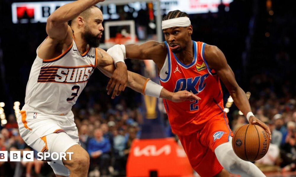 Shai Gilgeous-Alexander of the Oklahoma City Thunder drives to the baske