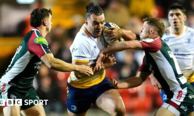 James Lowe carries the ball for Leinster against Leicester