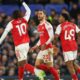 Gunners extend lead in fiery derby