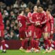 Reds hold on against nine-man Spurs