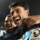 Sione Tuipulotu and Adam Hastings celebrate after Glasgow's win over Toulouse