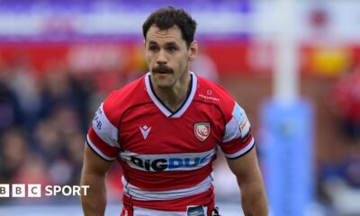 Tomos Williams standing on the pitch during a match for Gloucester