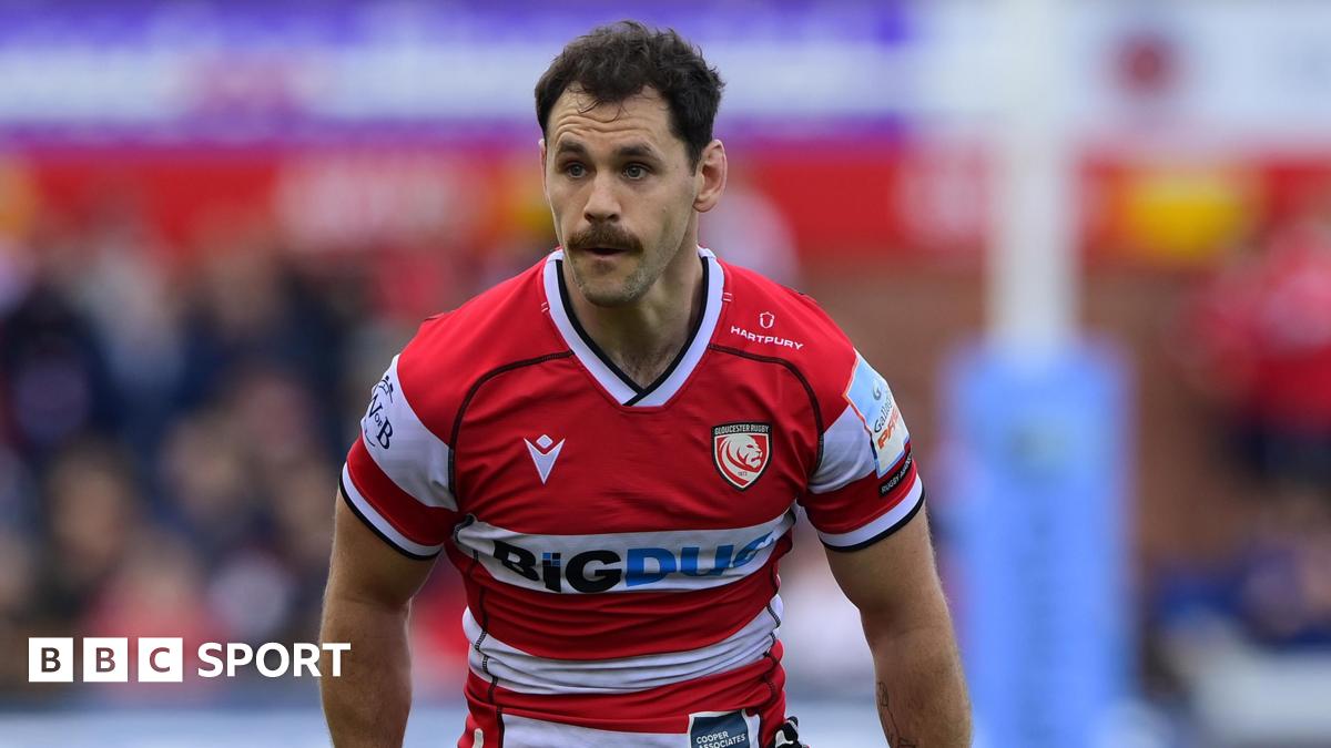 Tomos Williams standing on the pitch during a match for Gloucester