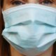 Should We Be Wearing Face Masks Again? Experts Say Yes