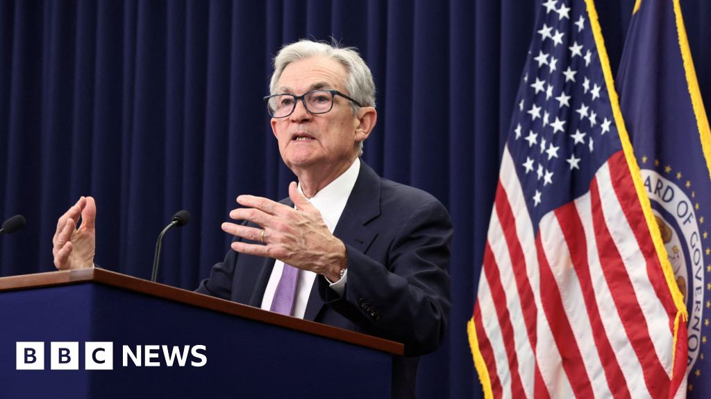 Fed Reserve cuts interest rates despite growing divisions