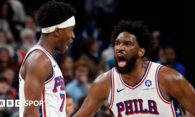 Joel Embiid celebrates with VJ Edgecombe after his winning shot