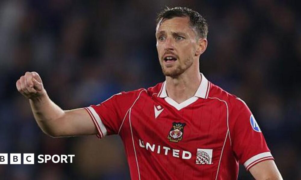 Dominic Hyam in action for Wrexham