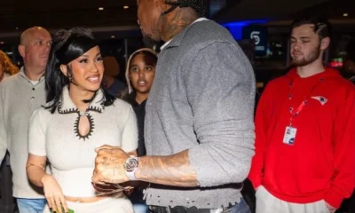 Cardi B Wears Ivory Chanel Coco Neige Cashmere and Alpaca Knit Set with Matching Trousers at Stefon Diggs’ Wellness Wonderland Event