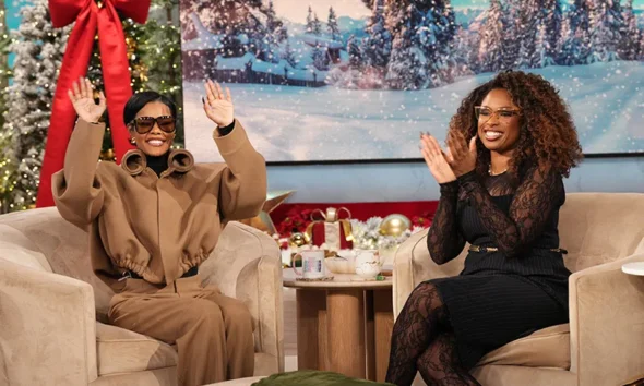 Teyana Taylor Brings Modern Elegance to The Jennifer Hudson Show in a Camel Victoria Beckham Fall 2025 Rolled Neck Suit