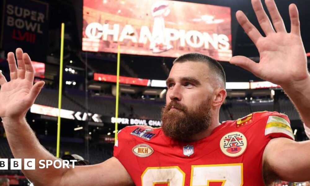 Travis Kelce waves to fans after the Kansas City Chiefs beat the San Francisco 49ers in the Super Bowl in 2024
