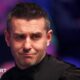 Mark Selby looks at the table