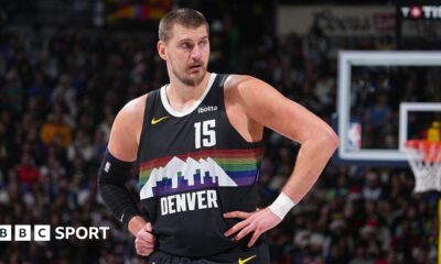 Nikola Jokic stood with his hands on his hips while playing for the Denver Nuggets