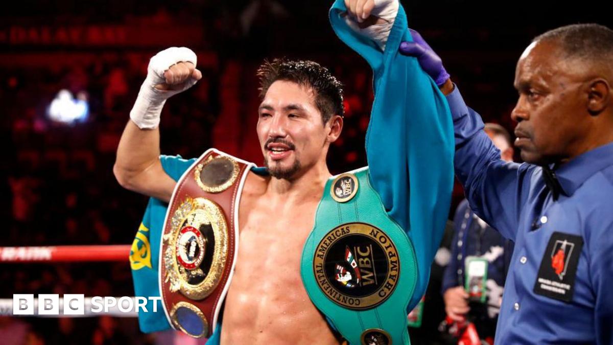 Janibek Alimkhanuly celebrates after beating Hassan N'Dam N'Jikam in 2021