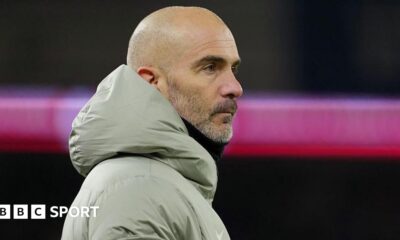 Chelsea manager Enzo Maresca looking across the pitch at Cardiff City