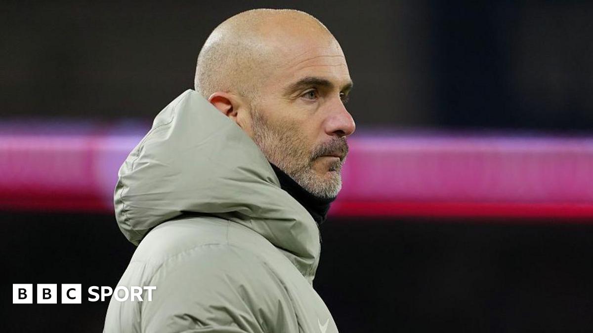 Chelsea manager Enzo Maresca looking across the pitch at Cardiff City