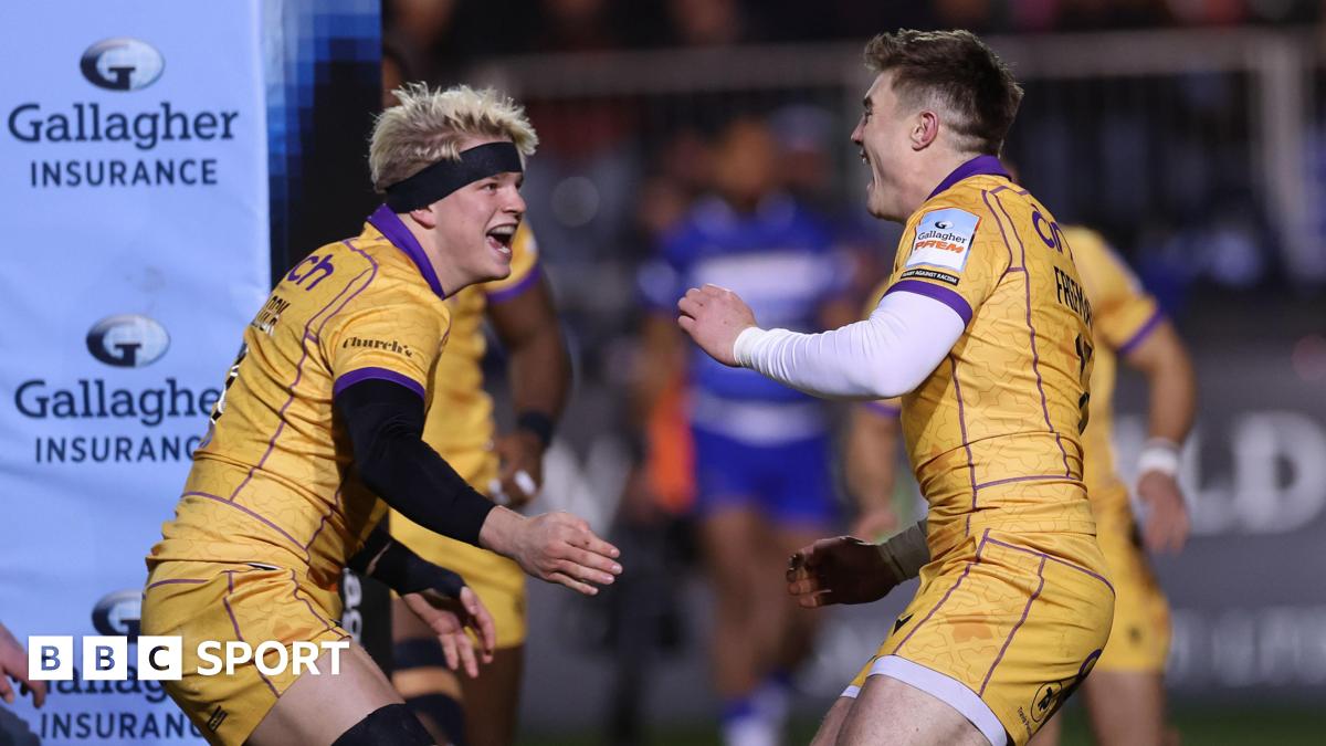 Henry Pollock (left) looks at Tommy Freeman (right) as both hold their arms out and mouths open ready to embrace in celebration of a try