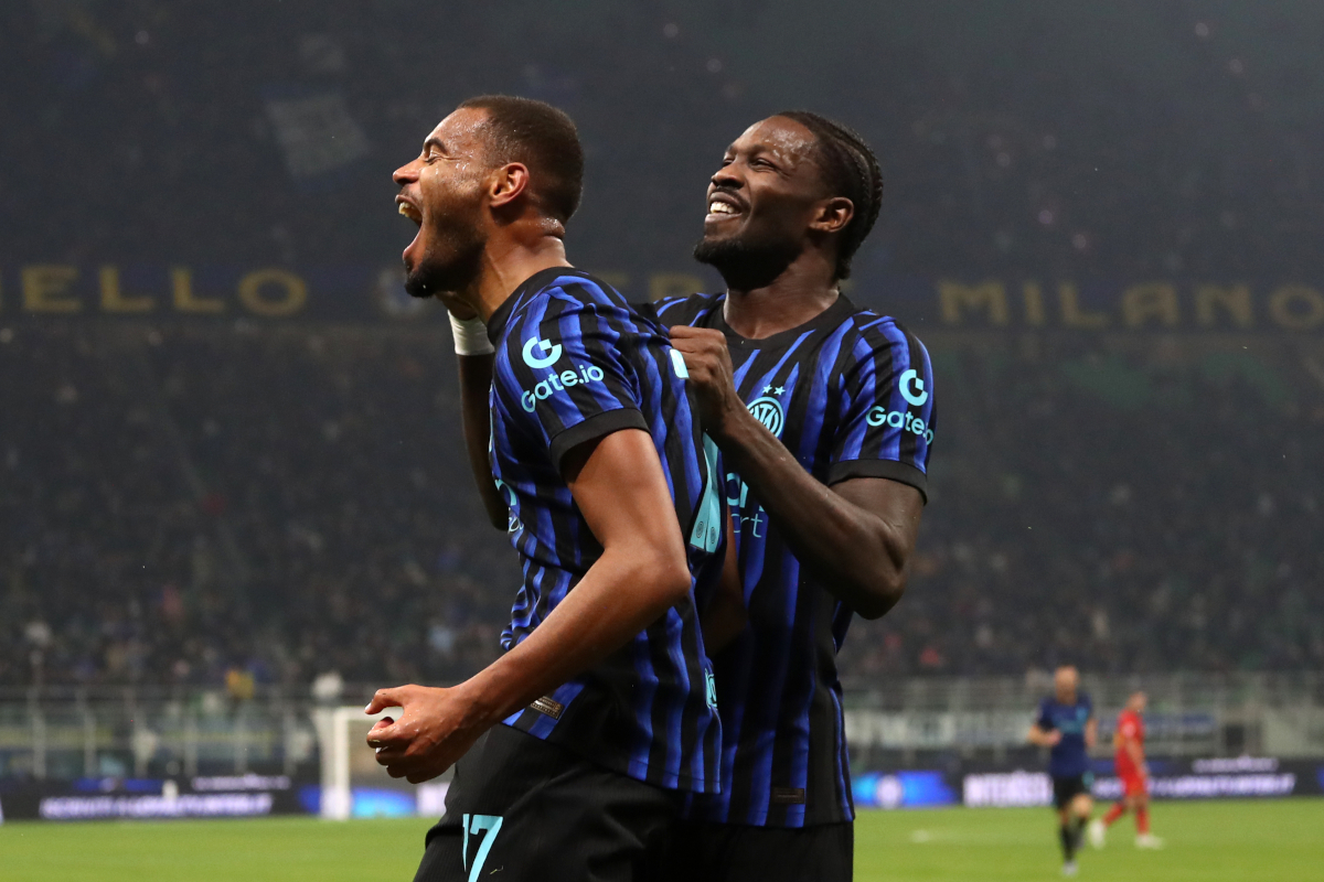 MILAN, ITALY - DECEMBER 03: Andy Diouf of FC Internazionale Milano celebrates scoring his team