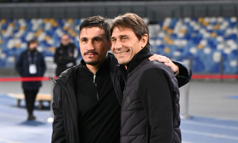 NAPLES, ITALY - DECEMBER 03: Fabio Pisacane, Head Coach of Cagliari, and Antonio Conte, Head Coach of SSC Napoli, pose for a photo prior to the Coppa Italia round of 16 match between SCC Napoli and Cagliari Calcio at Stadio Diego Armando Maradona on December 03, 2025 in Naples, Italy. (Photo by Francesco Pecoraro/Getty Images)