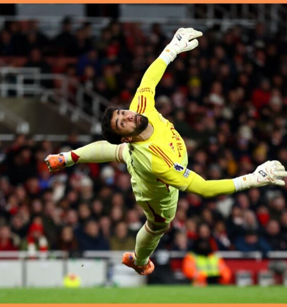 Arsenal goalkeeper David Raya makes a save from Brighton