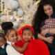 Cardi B Celebrates Christmas with Her Children in an Olive Green Bodycon Dress with Silver Metallic Heels