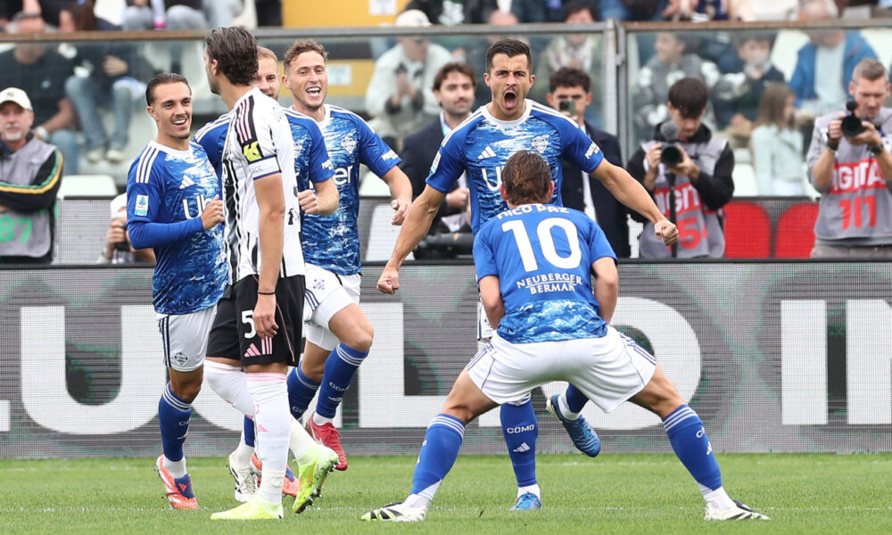 COMO, ITALY - OCTOBER 19: Marc Olivier Kenpf of Como 1907 celebrates with his team-mate Nico Paz after scoring their team