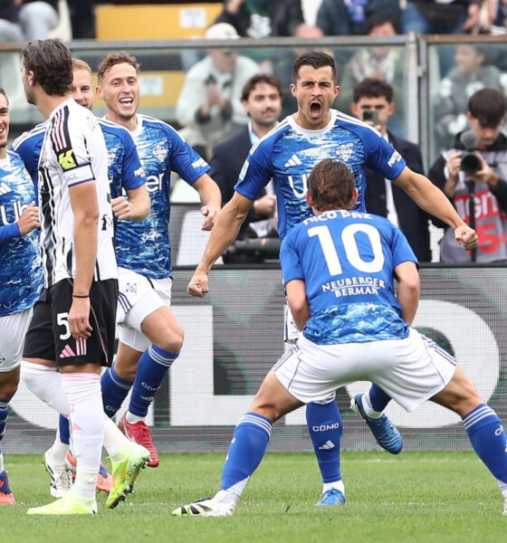 COMO, ITALY - OCTOBER 19: Marc Olivier Kenpf of Como 1907 celebrates with his team-mate Nico Paz after scoring their team
