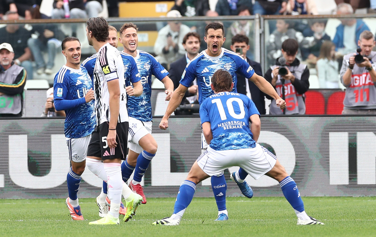 COMO, ITALY - OCTOBER 19: Marc Olivier Kenpf of Como 1907 celebrates with his team-mate Nico Paz after scoring their team