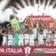 ROME, ITALY - MAY 14: Lewis Ferguson, Lorenzo De Silvestri and Riccardo Orsolini of Bologna lift the Coppa Italia trophy as their team mates celebrate after the team