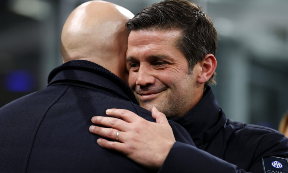 MILAN, ITALY - DECEMBER 09: Arne Slot, Manager of Liverpool, and Cristian Chivu, Head Coach of FC Internazionale Milano, embrace prior to the UEFA Champions League 2025/26 League Phase MD6 match between FC Internazionale Milano and Liverpool FC at Stadio San Siro on December 09, 2025 in Milan, Italy. (Photo by Justin Setterfield/Getty Images)