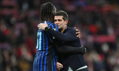MADRID, SPAIN - NOVEMBER 26: Cristian Chivu, Head Coach of Internazionale, and Yann Aurel Bisseck of Internazionale embrace after the UEFA Champions League 2025/26 League Phase MD5 match between Atletico de Madrid and FC Internazionale Milano at Estadio Metropolitano on November 26, 2025 in Madrid, Spain. (Photo by David Ramos/Getty Images)