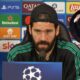 Alisson Becker giving press-conference with overlay of Salah against Leeds