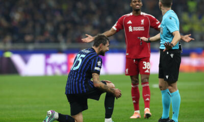 MILAN, ITALY - DECEMBER 09: Francesco Acerbi of FC Internazionale lies injured during the UEFA Champions League 2025/26 League Phase MD6 match between FC Internazionale Milano and Liverpool FC at Stadio San Siro on December 09, 2025 in Milan, Italy. (Photo by Marco Luzzani/Getty Images)