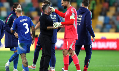 UDINE, ITALY - OCTOBER 14: Gennaro Gattuso, Head Coach of Italy, interacts with Gianluigi Donnarumma of Italy after the team