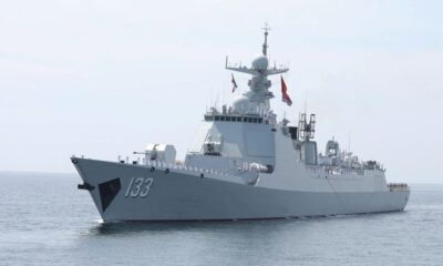 Exclusive-China massing military ships across region in show of maritime force, sources say