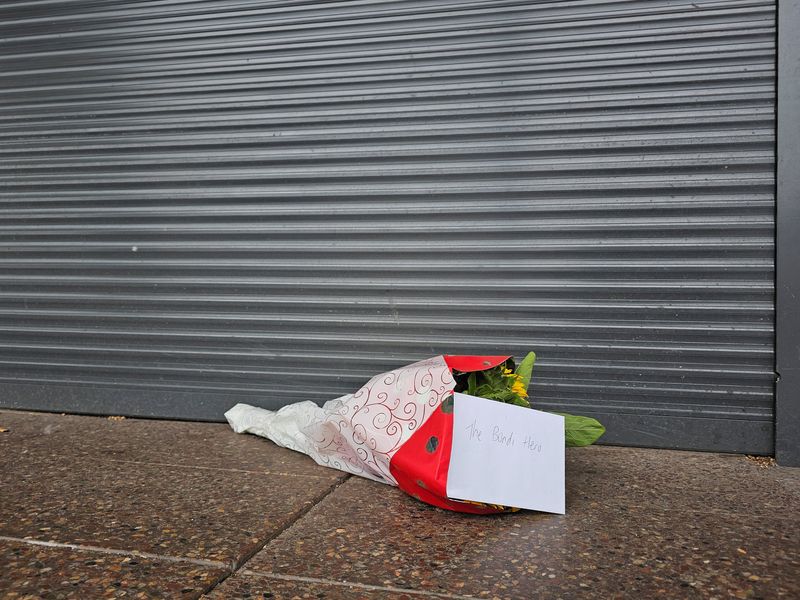Floral tributes for Australian 'Hero' who disarmed Bondi gunman