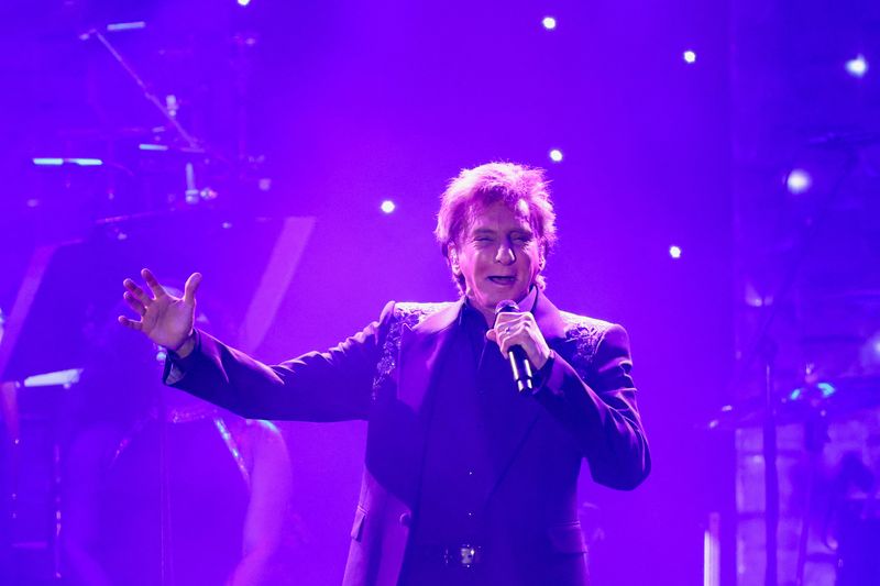 Barry Manilow shares cancer diagnosis as surgery prompts concert cancellations