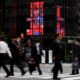 Japan expects growth to accelerate next year with fiscal stimulus