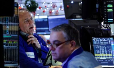 Wall St hovers near all-time highs in light, post-holiday session